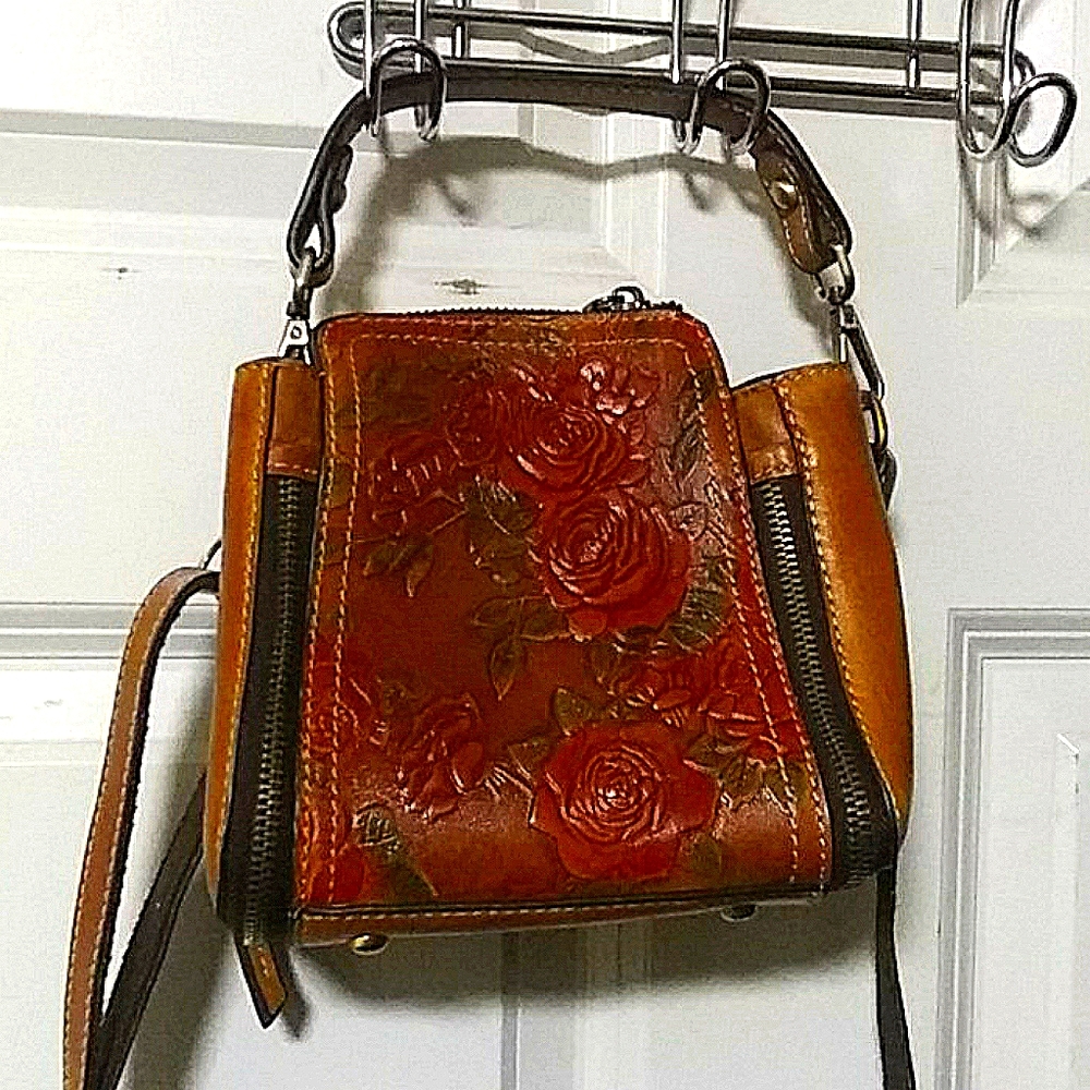 Tooled leather purse embossed floral design